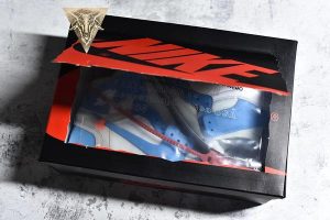 Off-White x Air Jordan 1 Retro High OG UNC - Image 12