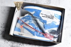 Off-White x Air Jordan 1 Retro High OG UNC - Image 11
